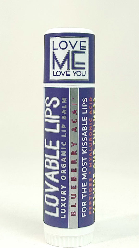Blue lip balm tube with white cap and purple label text
