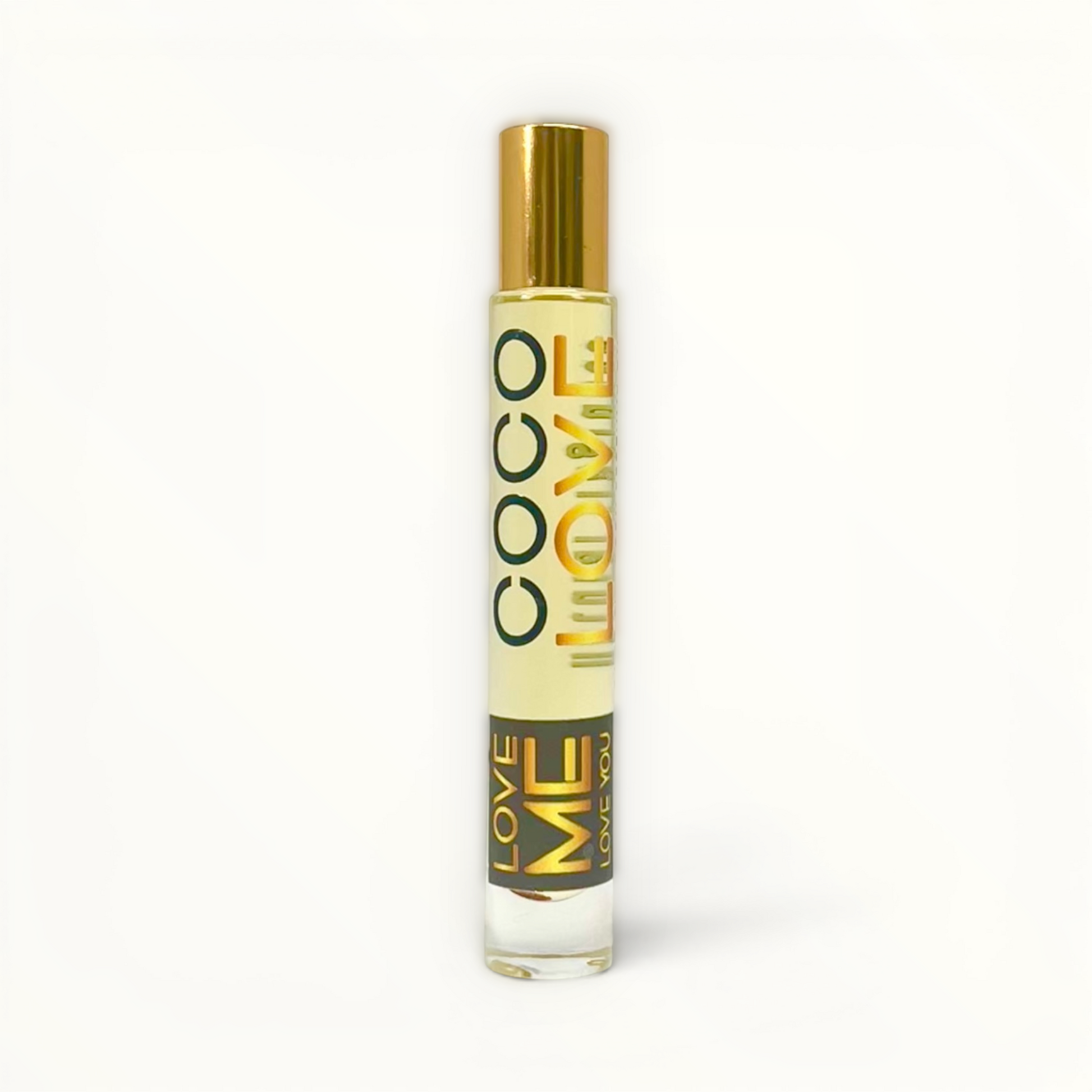 Coco Love roll-on body perfume oil in gold-capped bottle, amber liquid