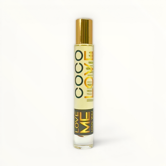 Coco Love roll-on body perfume oil in gold-capped bottle, amber liquid