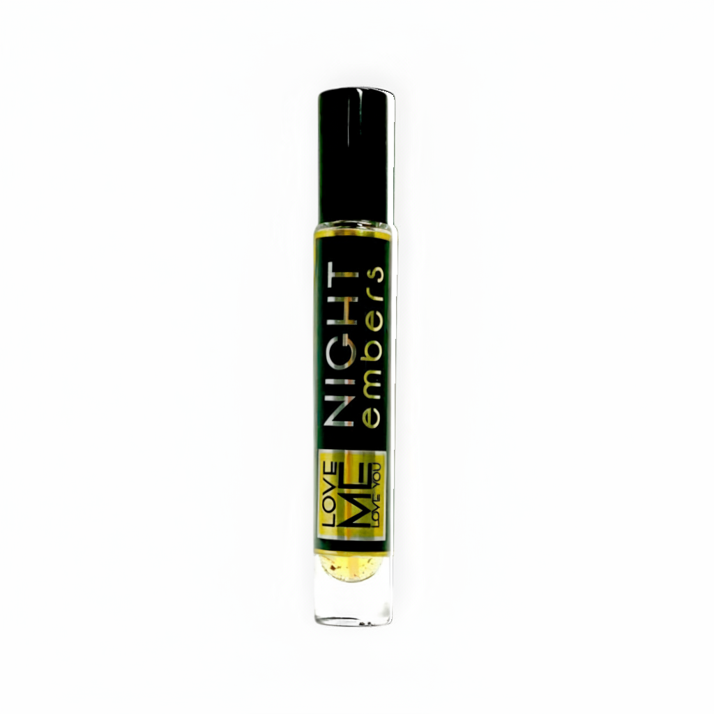 Clear eau de parfum spray bottle with black cap and gold label
