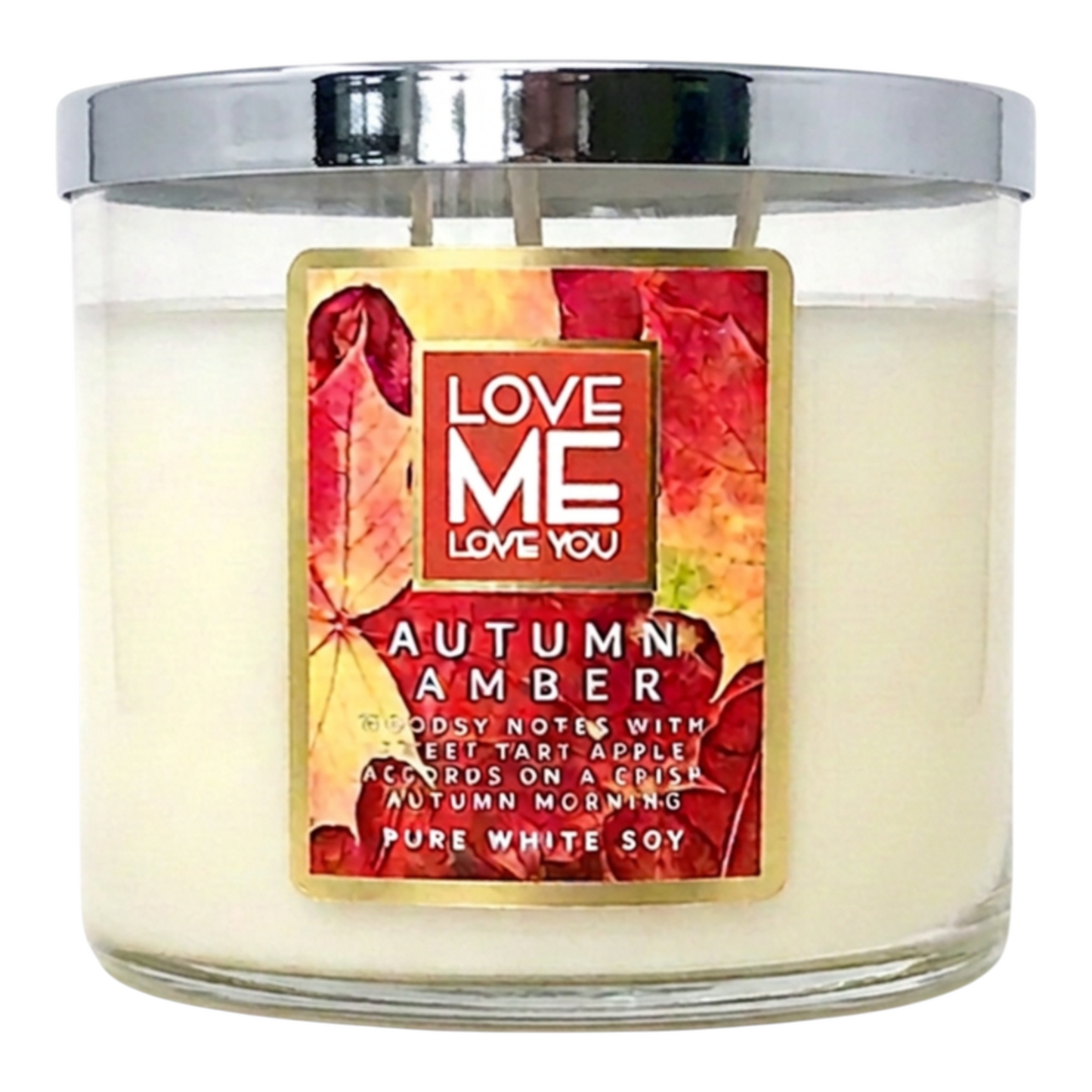 Autumn amber candle in clear glass jar with printed label and cream wax