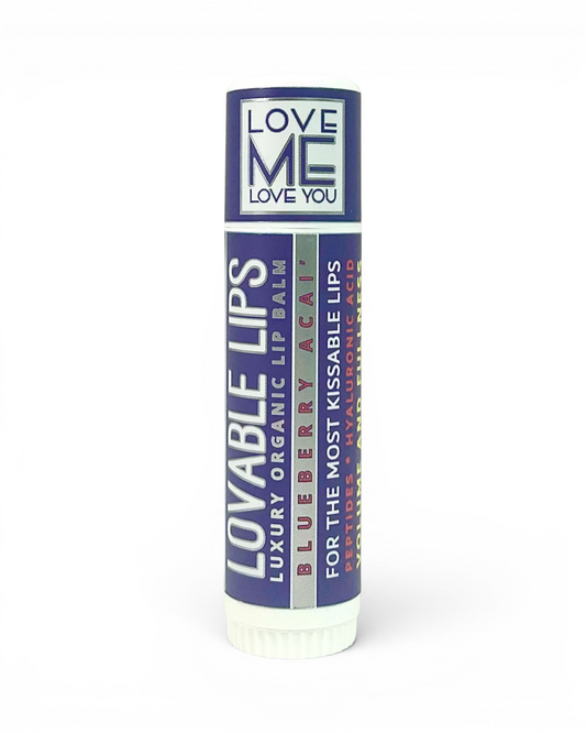 Lip balm tube with Blueberry Açaí flavor and Love Me Love You branding