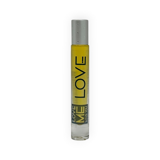 Roll-on body parfum oil in clear glass bottle with yellow liquid and gray cap