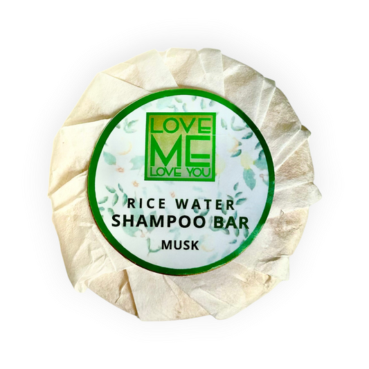 Musk shampoo bar in cream paper wrap with round “Rice Water Shampoo Bar” label