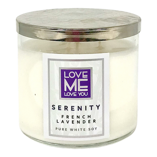 White glass jar soy candle with silver lid and Serenity French Lavender label