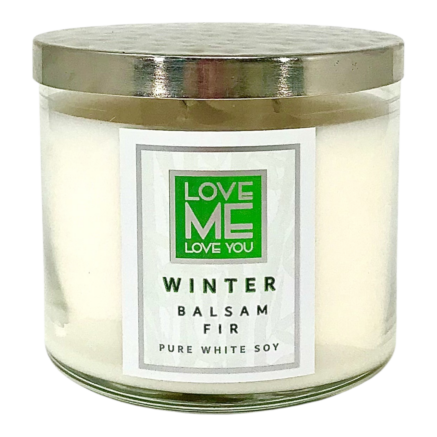 Winter candle in clear glass jar with silver lid; green-and-white label